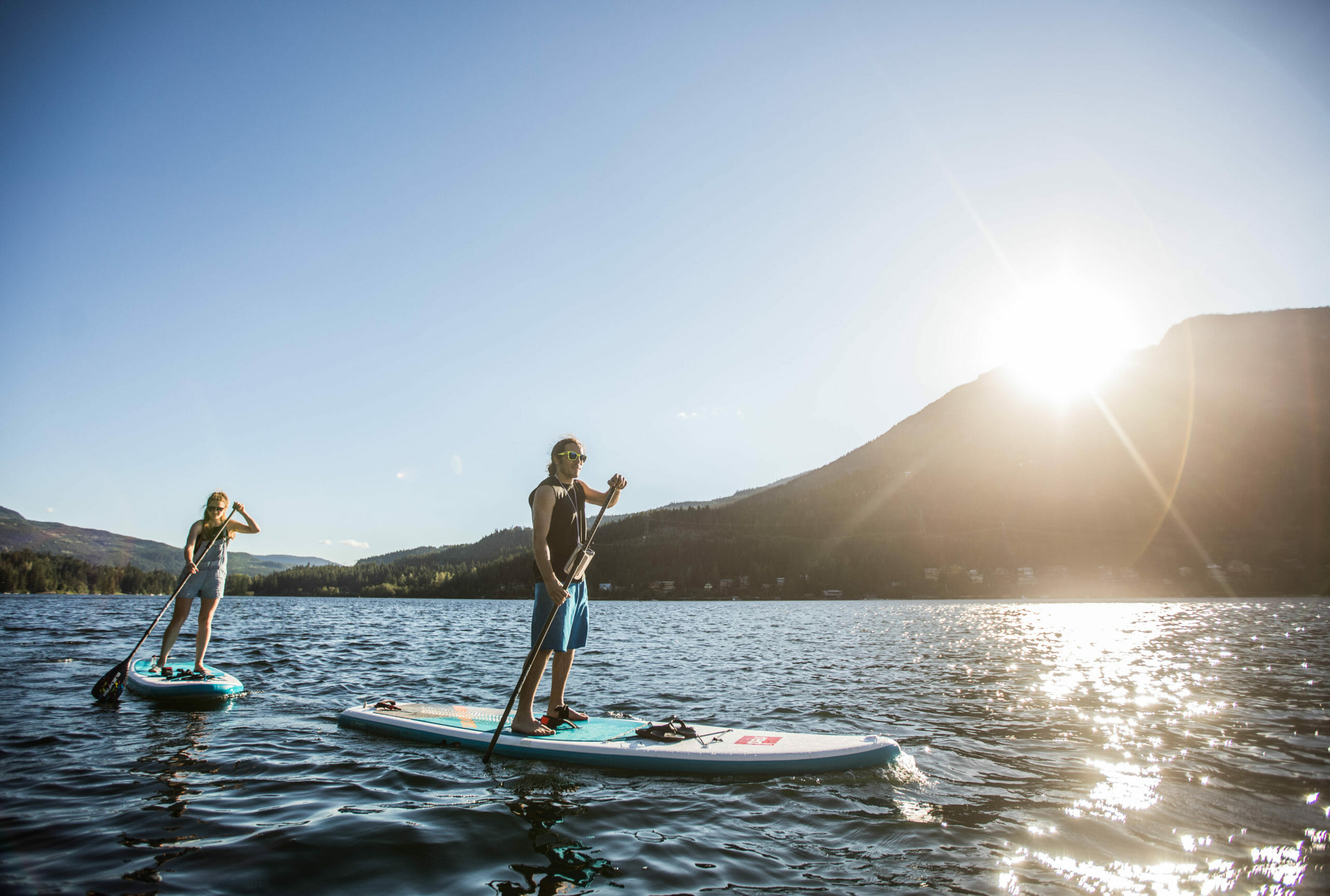 Couple paddleboarding on Alta Lake